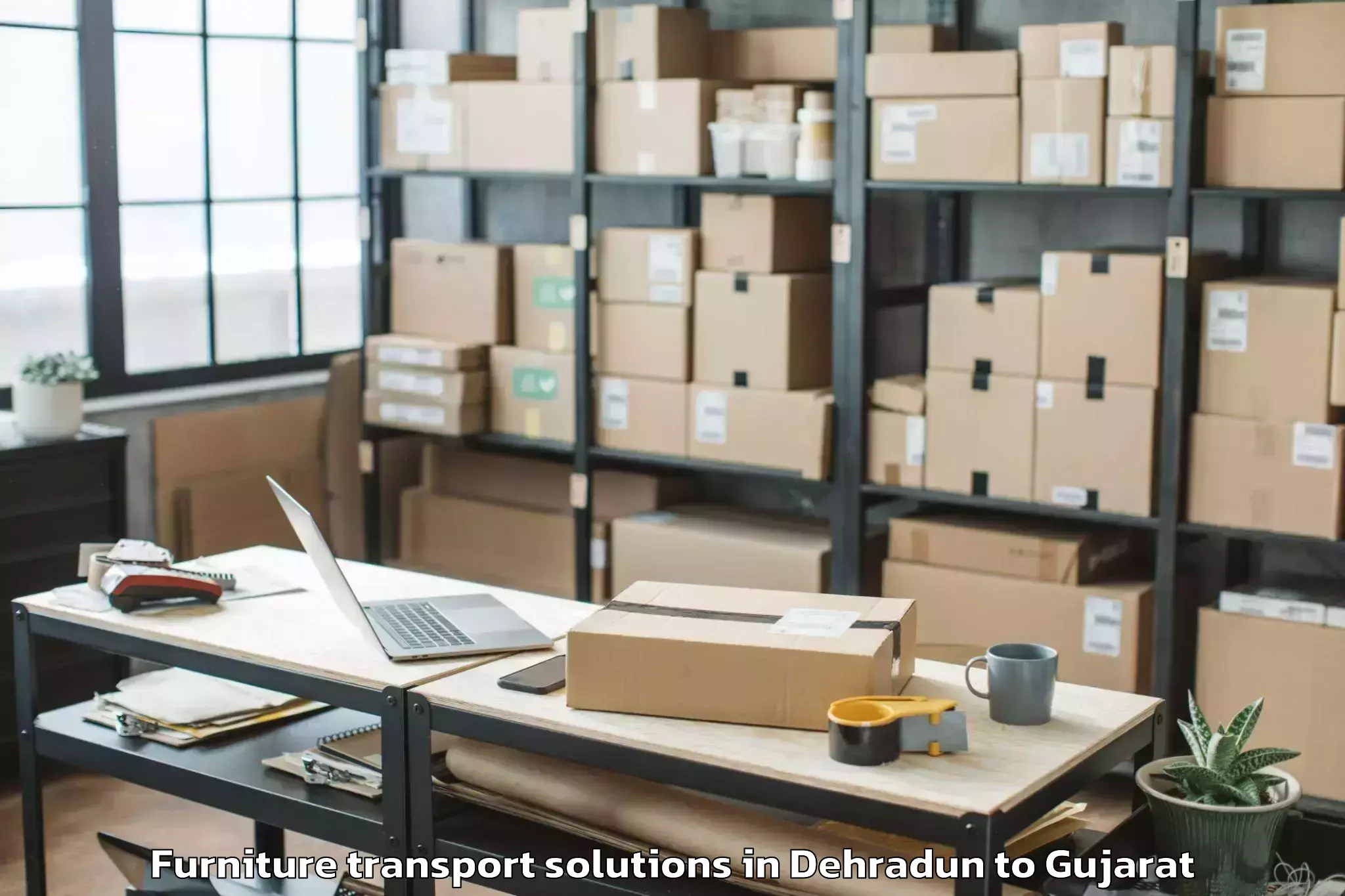 Top Dehradun to Vadgam Furniture Transport Solutions Available